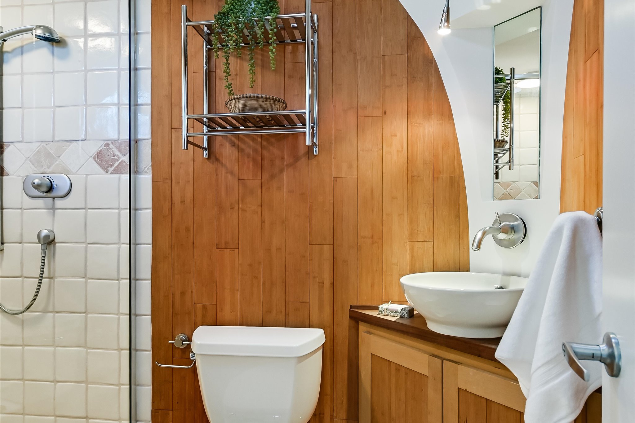 14 Rob Roy Road Austin, TX 78746 - Photo 20 of 40 a bathroom with a granite countertop sink and a mirror