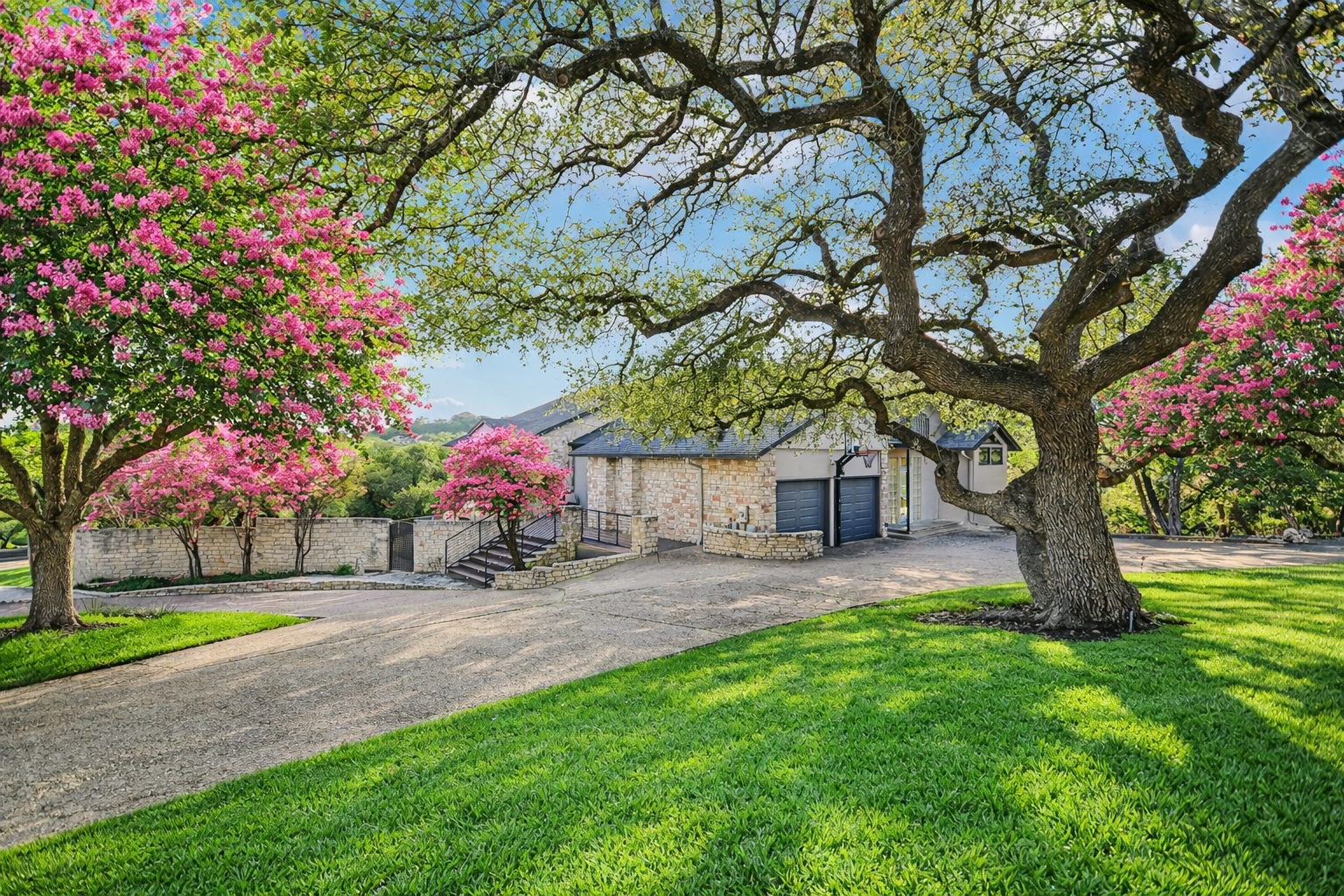14 Rob Roy Road Austin, TX 78746 - Photo 2 of 40 a front view of a house with a yard and tree s