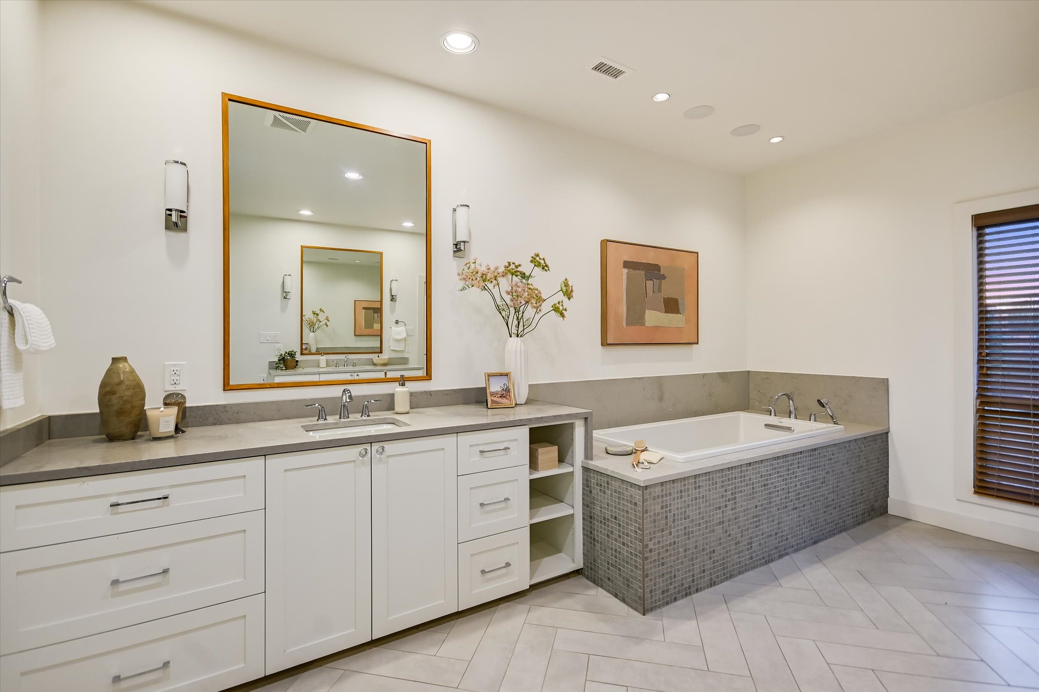 14 Rob Roy Road Austin, TX 78746 - Photo 25 of 40 a spacious bathroom with a granite countertop double vanity sink a mirror and bathtub