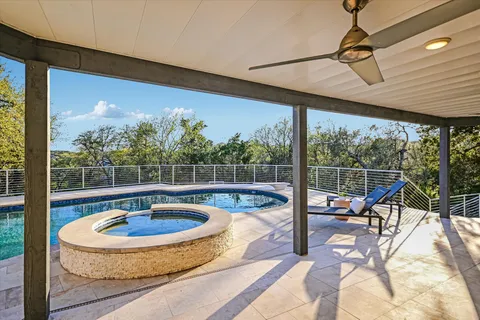 a view of a house with outdoor space and sitting area