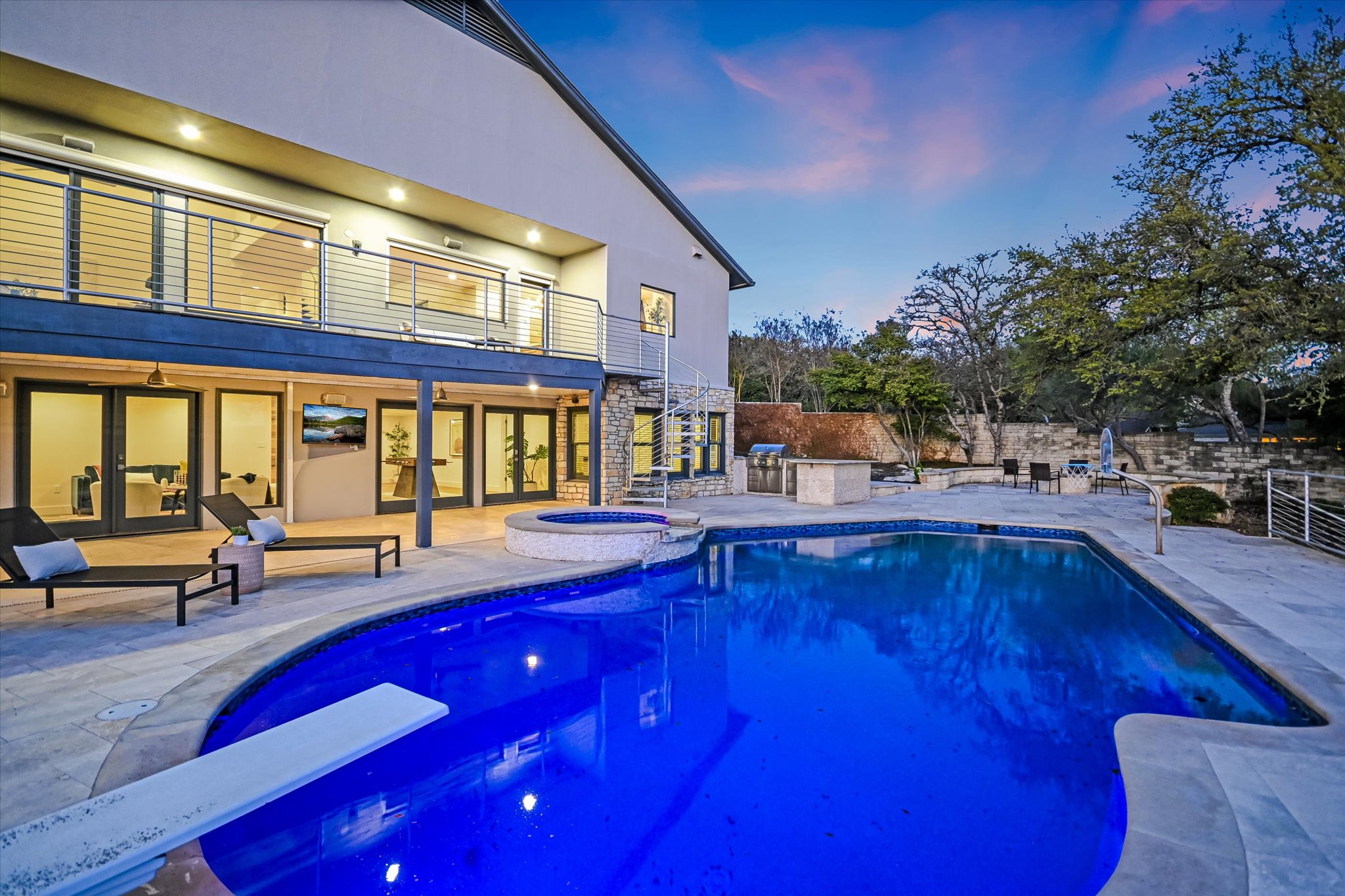 14 Rob Roy Road Austin, TX 78746 - Photo 33 of 40 a living room with furniture and a swimming pool