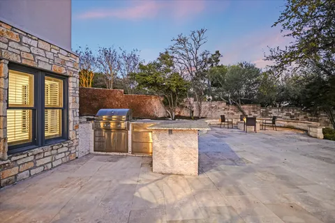 a backyard of a house with lots of green space
