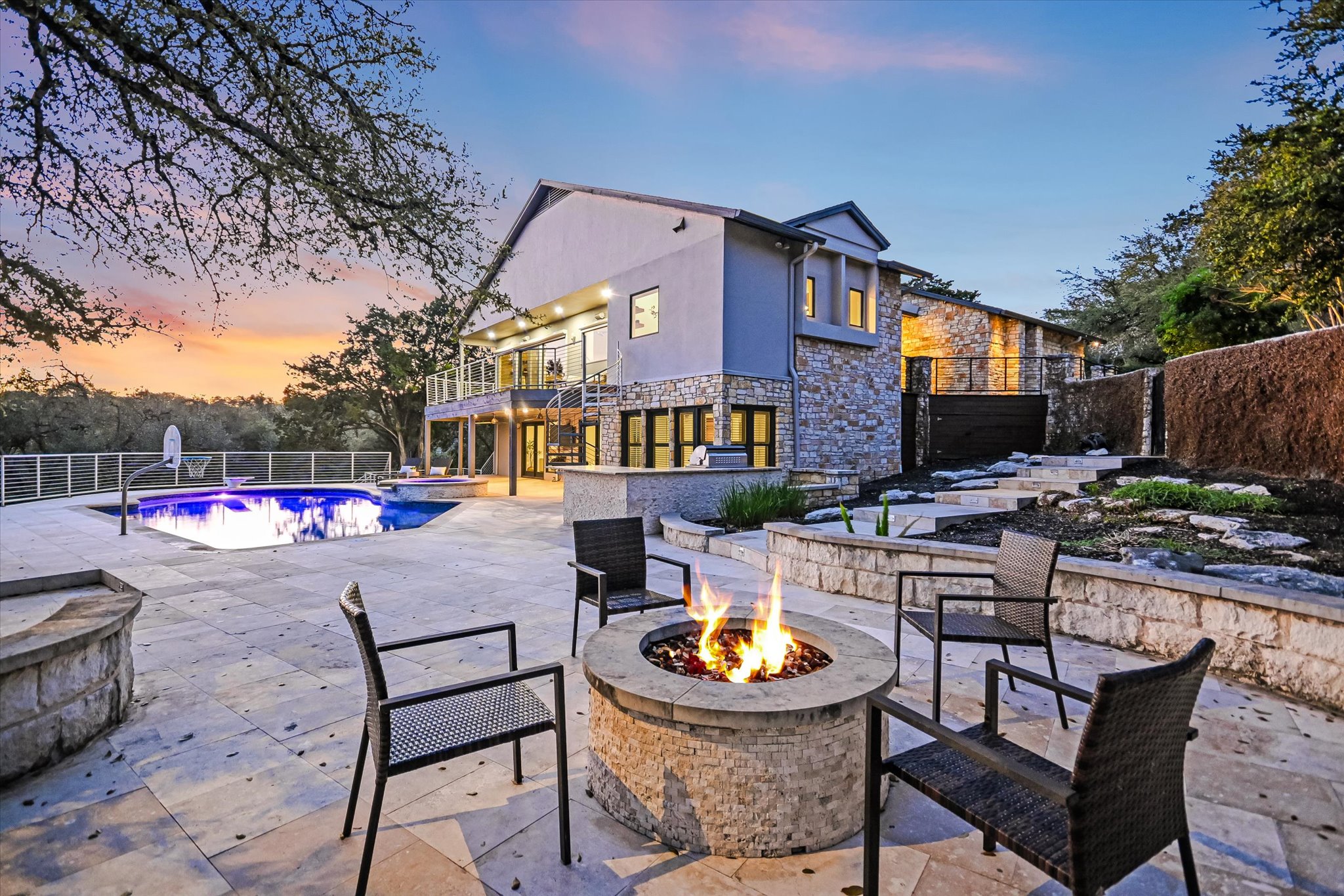 14 Rob Roy Road Austin, TX 78746 - Photo 37 of 40 a view of a patio with couches table and chairs and potted plants