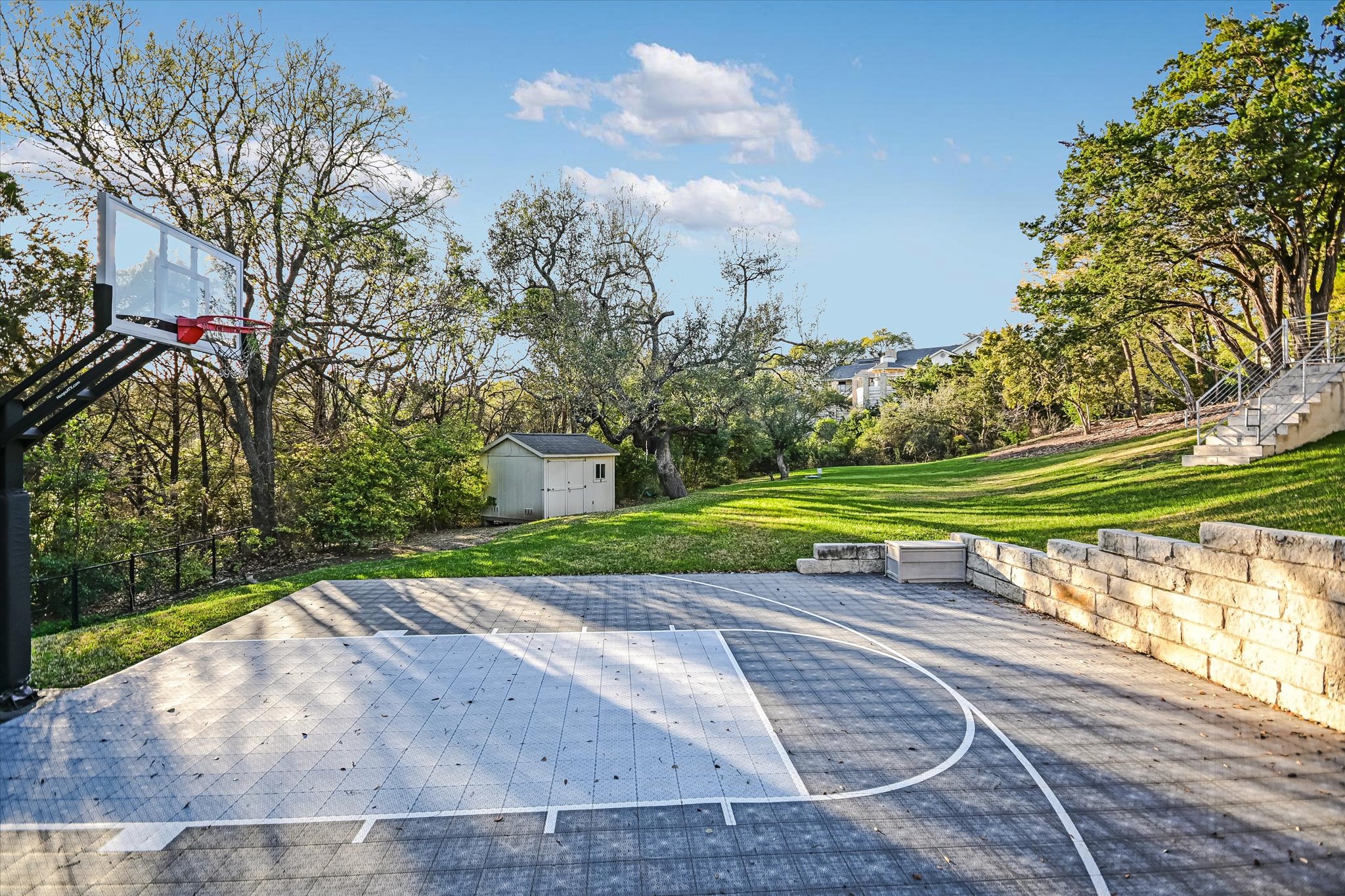 14 Rob Roy Road Austin, TX 78746 - Photo 38 of 40 The sport court is perfectly situated next to the large back lawn