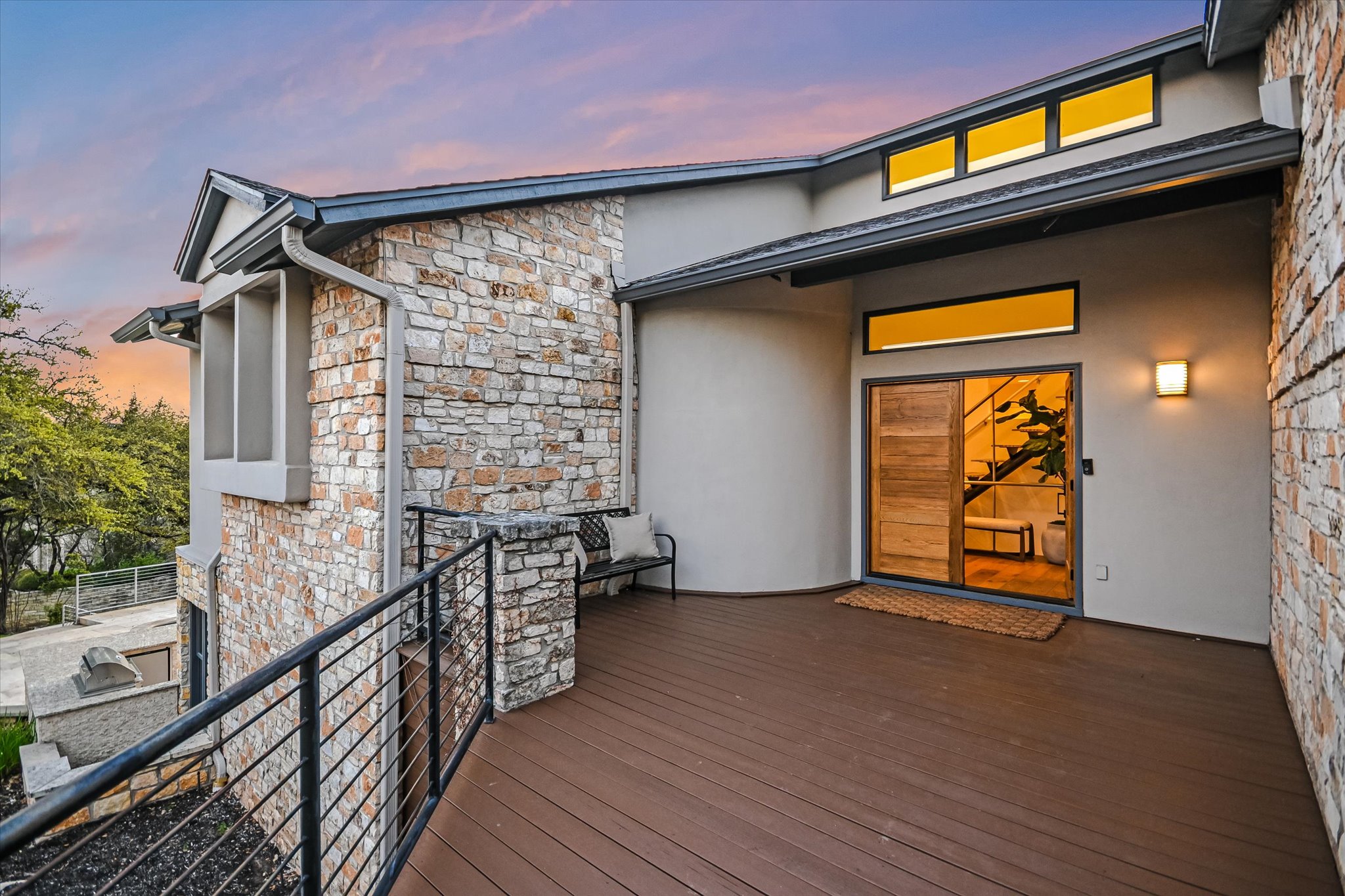 14 Rob Roy Road Austin, TX 78746 - Photo 5 of 40 The elevated front deck offers treetop views