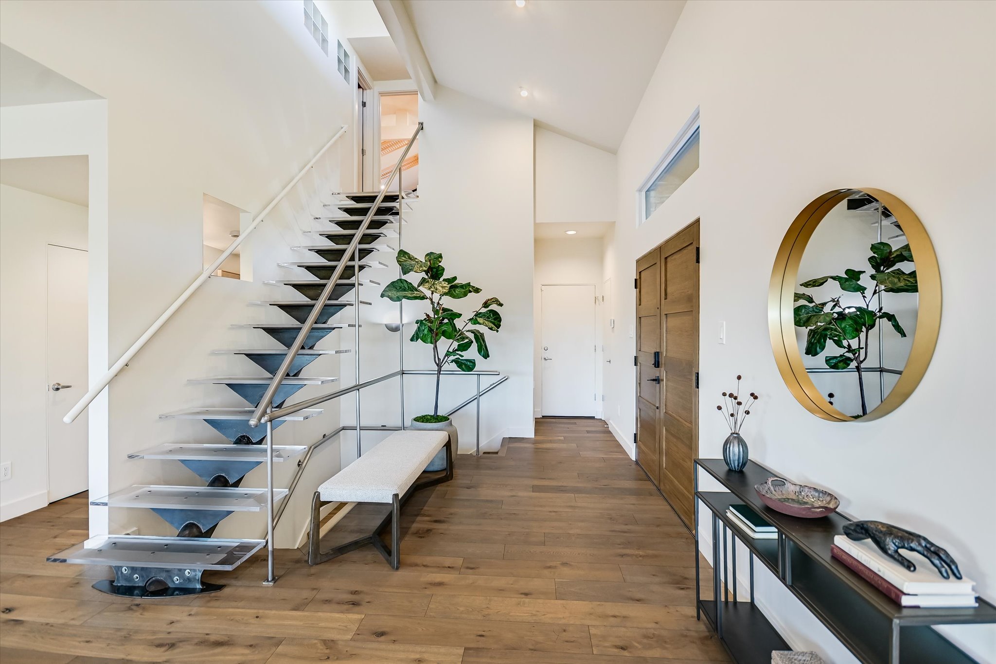 14 Rob Roy Road Austin, TX 78746 - Photo 7 of 40 a view of entryway with wooden floor