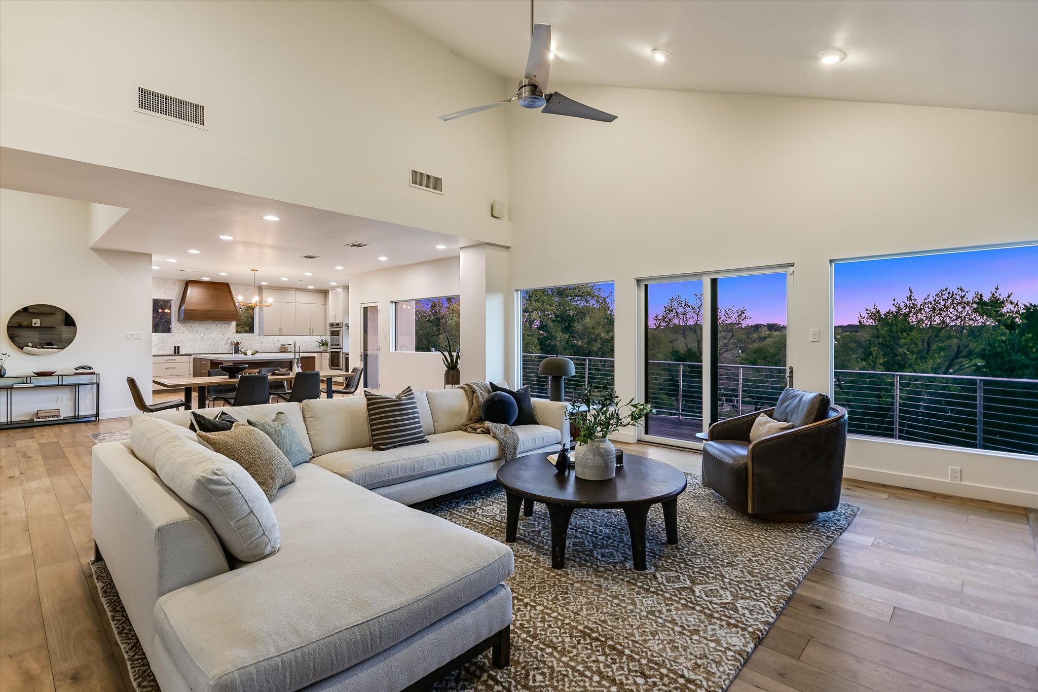 14 Rob Roy Road Austin, TX 78746 - Photo 10 of 40 a living room with furniture and a floor to ceiling window