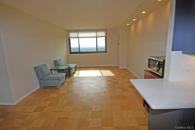 a workspace with furniture and window