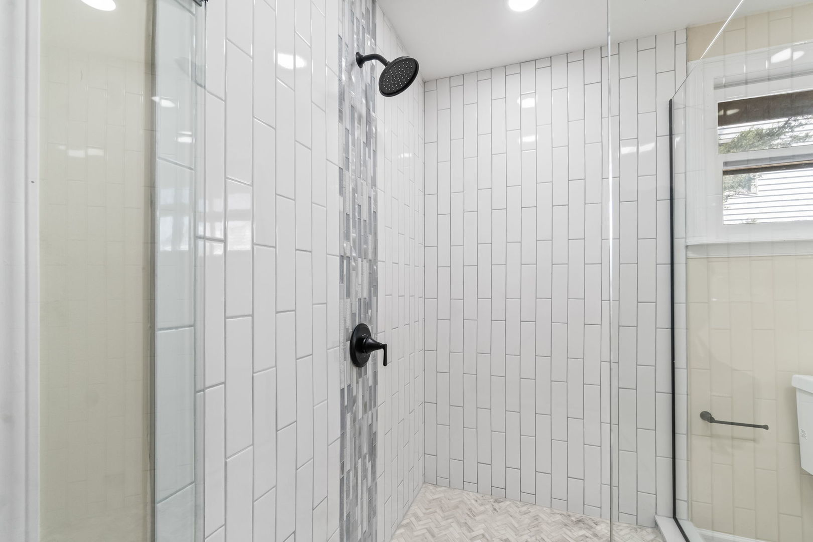 7730 Virginia Court Willowbrook, IL 60527 - Photo 16 of 23 a bathroom with a shower