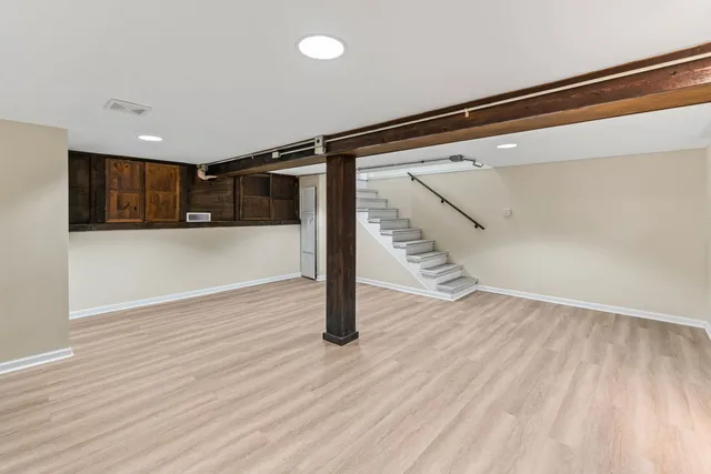 a view of entryway with wooden floor