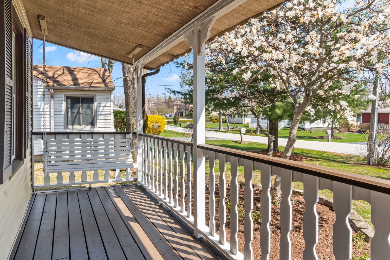 7730 Virginia Court Willowbrook, IL 60527 - Photo 5 of 23 a view of a porch with wooden floor and outdoor seating