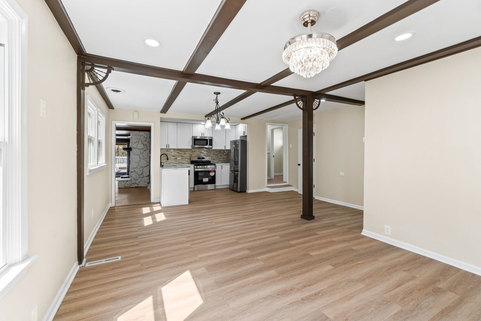 7730 Virginia Court Willowbrook, IL 60527 - Photo 6 of 23 a view of a hallway with wooden floor