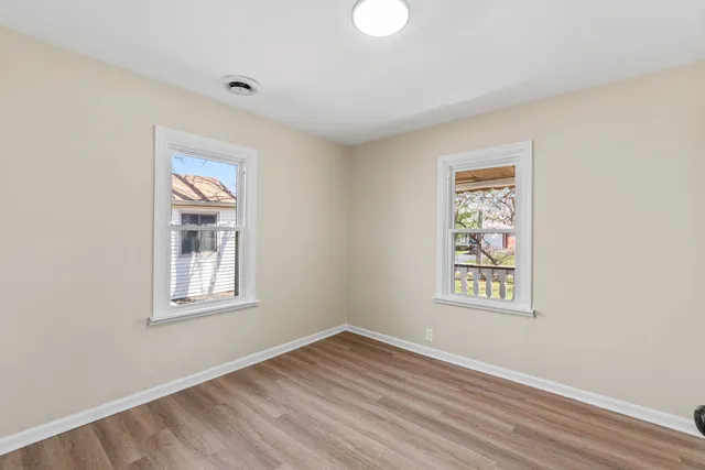 an empty room with windows