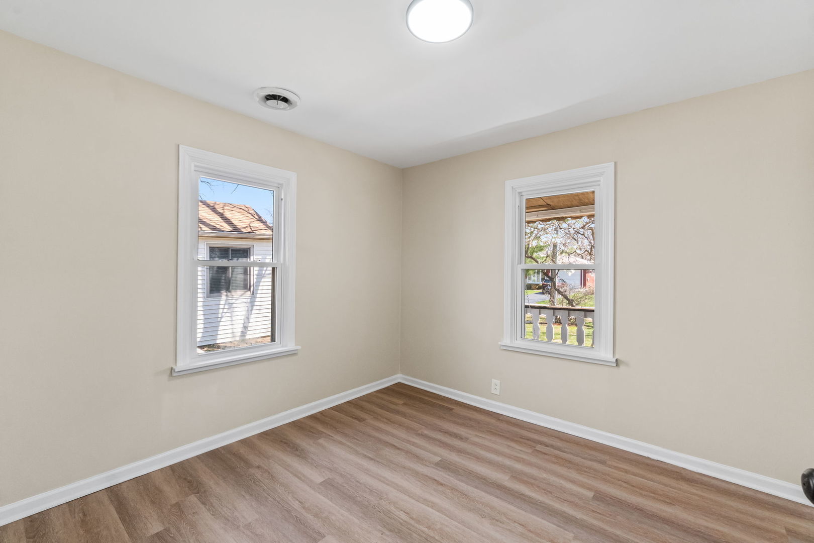 7730 Virginia Court Willowbrook, IL 60527 - Photo 10 of 23 an empty room with windows