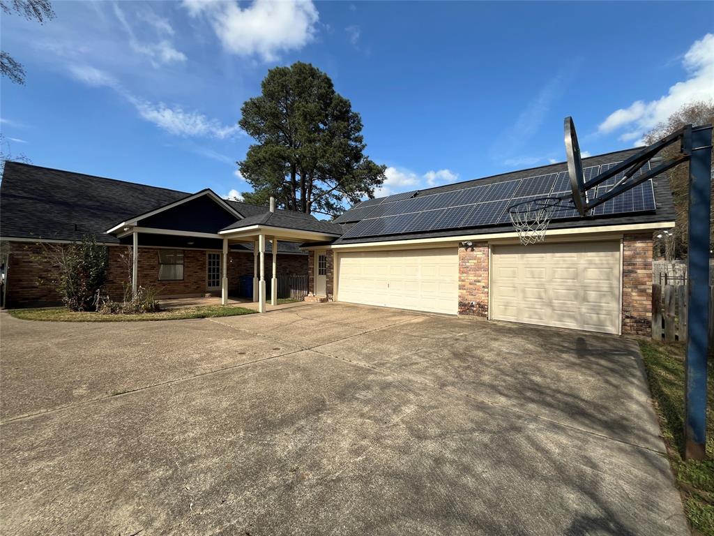 3321 Colquitt Road Shreveport, LA 71118 - Photo 32 of 33 3 car garage with solar panels