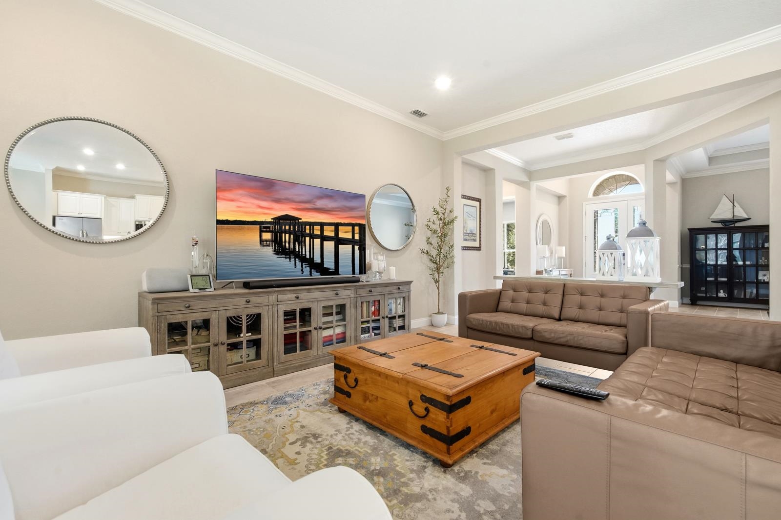 170 Antolin Way St. Augustine, FL 32095 - Photo 16 of 85 a living room with furniture and a large mirror