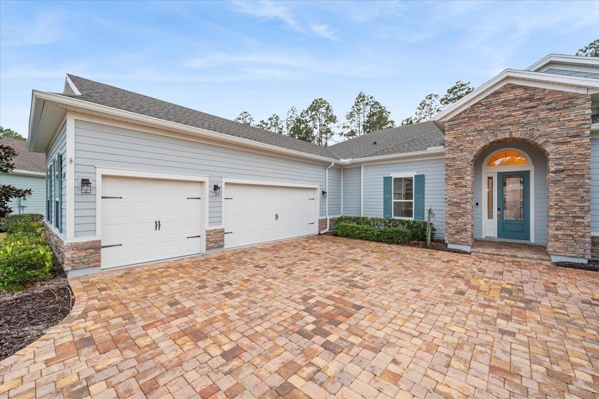 170 Antolin Way St. Augustine, FL 32095 - Photo 4 of 85 a front view of a house with a yard and garage