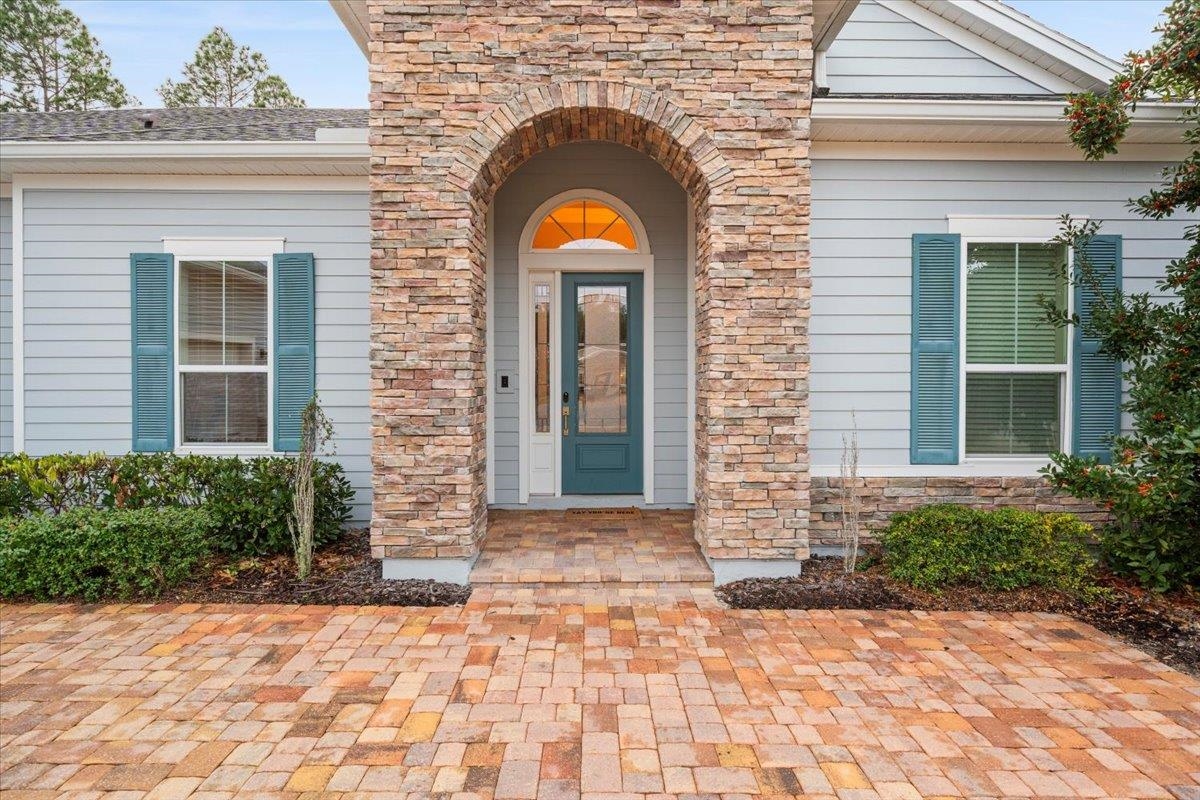 170 Antolin Way St. Augustine, FL 32095 - Photo 5 of 85 Entrance to property with stone siding