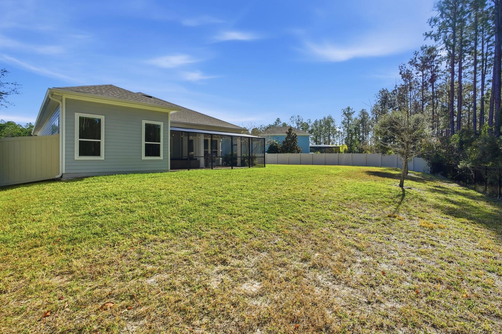 170 Antolin Way St. Augustine, FL 32095 - Photo 57 of 85 Fenced backyard featuring a sunroom