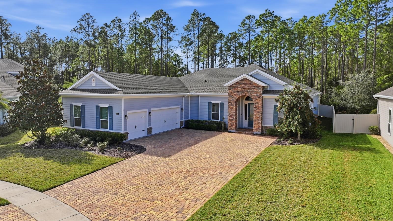 170 Antolin Way St. Augustine, FL 32095 - Photo 67 of 85 a front view of a house with a garden