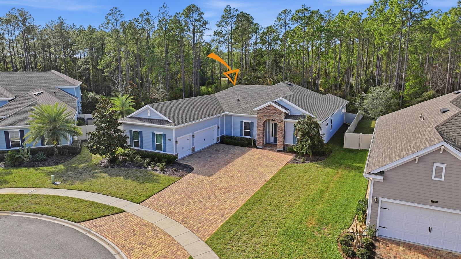 170 Antolin Way St. Augustine, FL 32095 - Photo 71 of 85 a aerial view of a house with a yard table and chairs