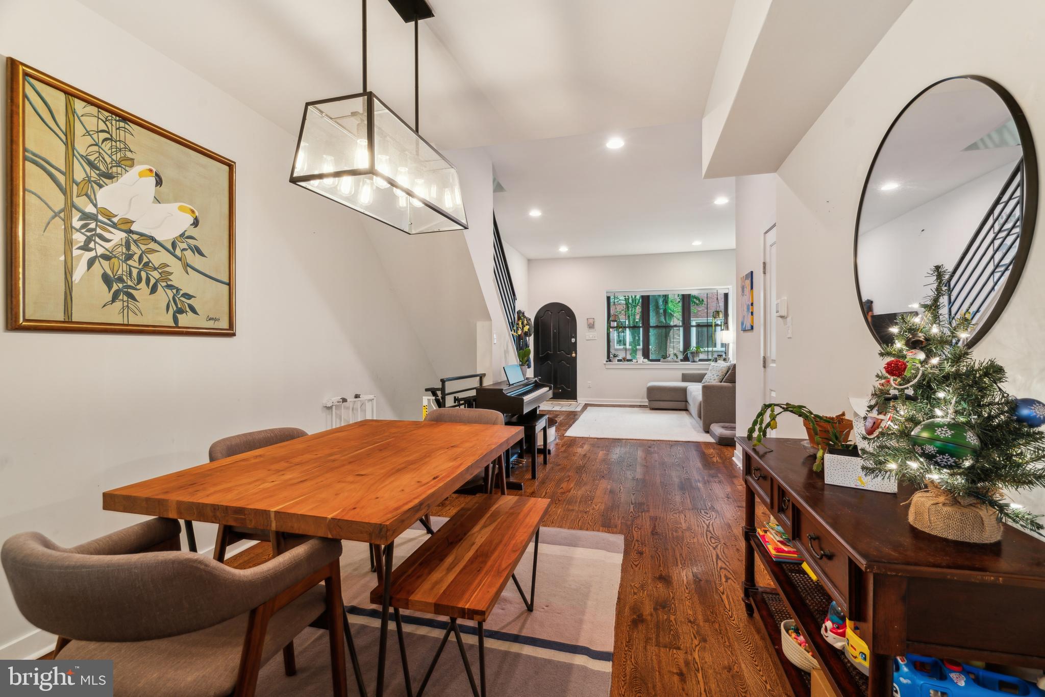 1319 Tasker Street Philadelphia, PA 19148 - Photo 11 of 23 a view of a dining room with furniture and wooden floor