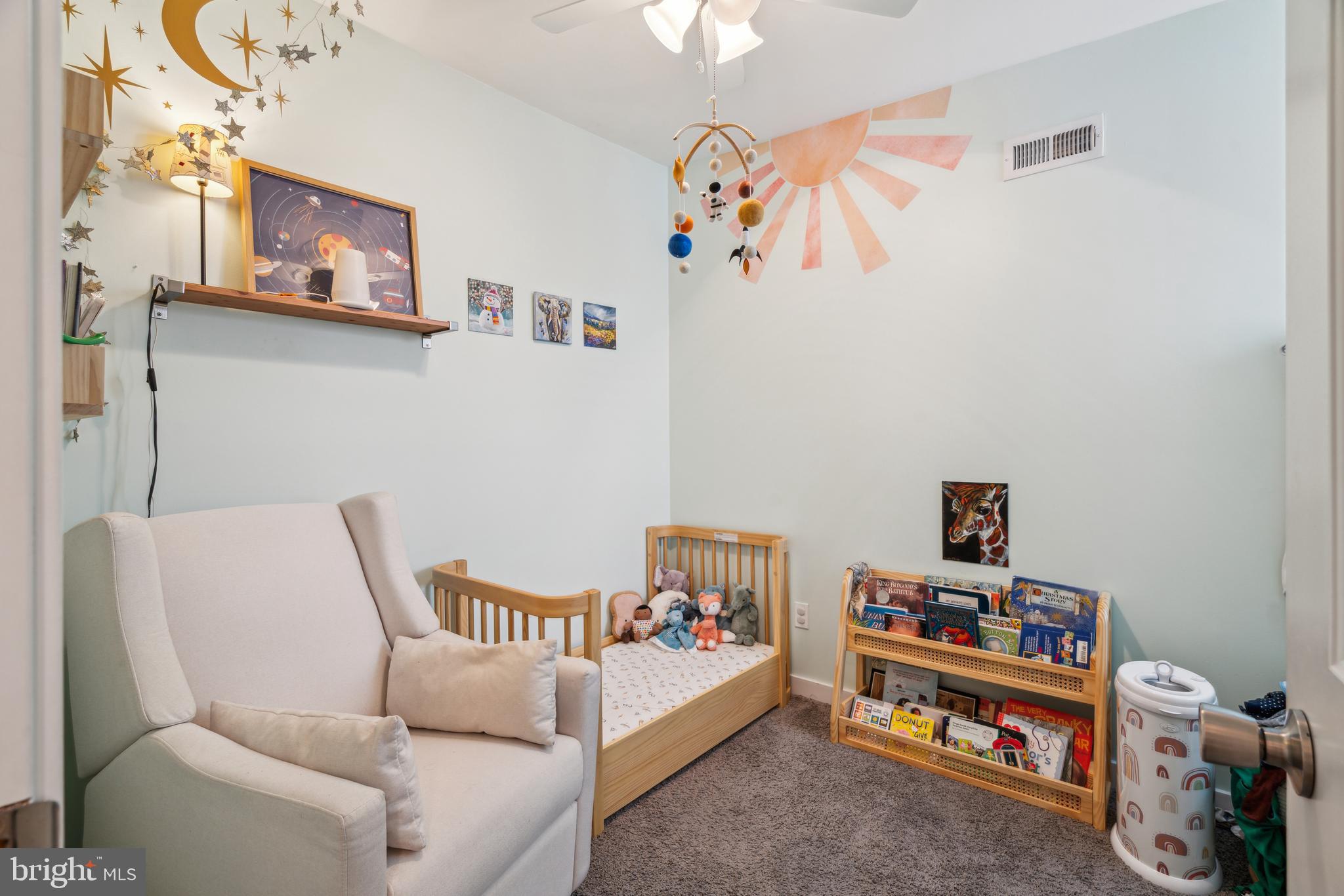 1319 Tasker Street Philadelphia, PA 19148 - Photo 16 of 23 a bedroom with furniture and a wooden floor