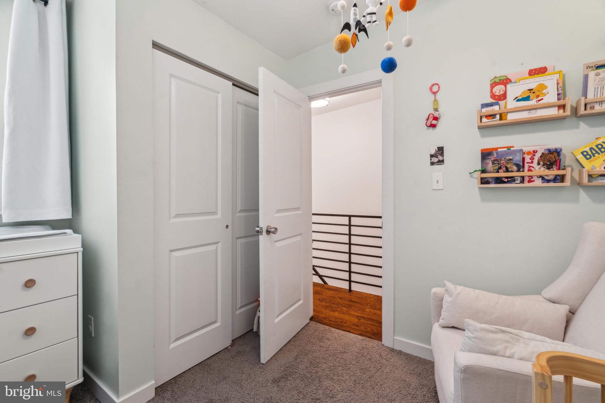 1319 Tasker Street Philadelphia, PA 19148 - Photo 17 of 23 a room with furniture and white walls