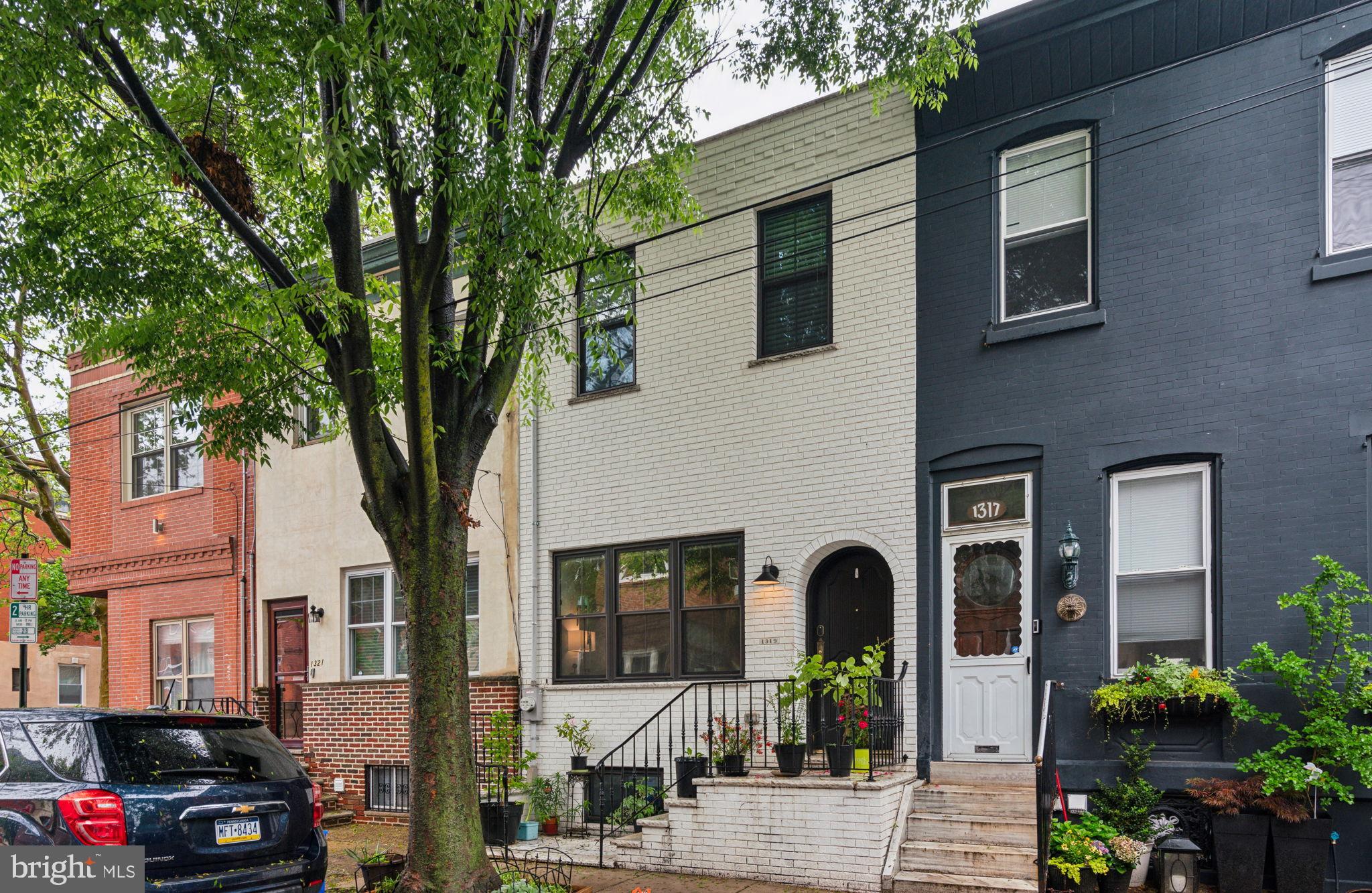 1319 Tasker Street Philadelphia, PA 19148 - Photo 2 of 23 a front view of a house with many windows