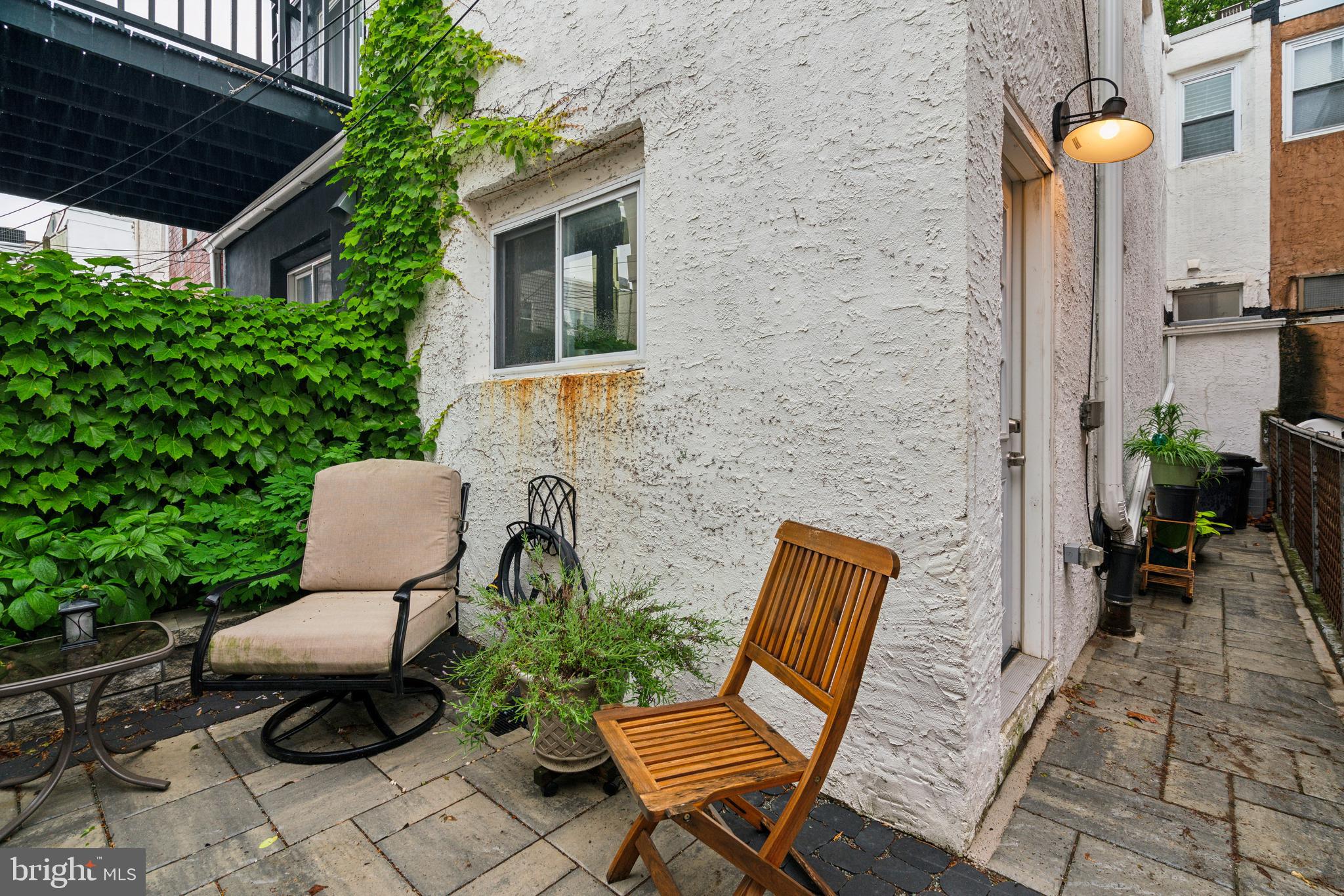 1319 Tasker Street Philadelphia, PA 19148 - Photo 8 of 23 a view of chair and bench in the patio