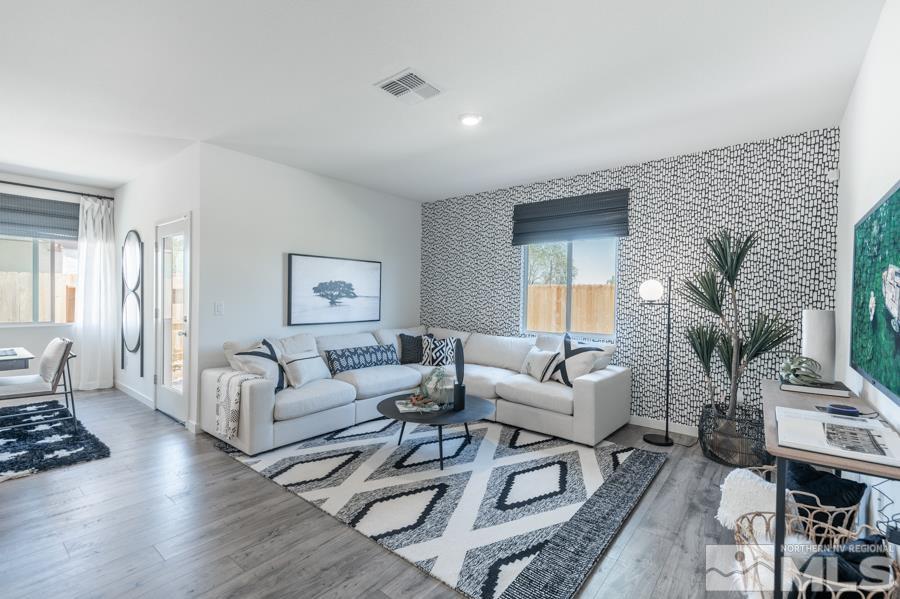 506 Russell Road, Unit LOT #95 Dayton, NV 89403 - Photo 5 of 21 a living room with furniture and a wooden floor