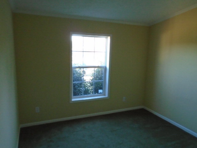 825 Old Indian Springs Road Forsyth, GA 31029 - Photo 14 of 21 an empty room with a window