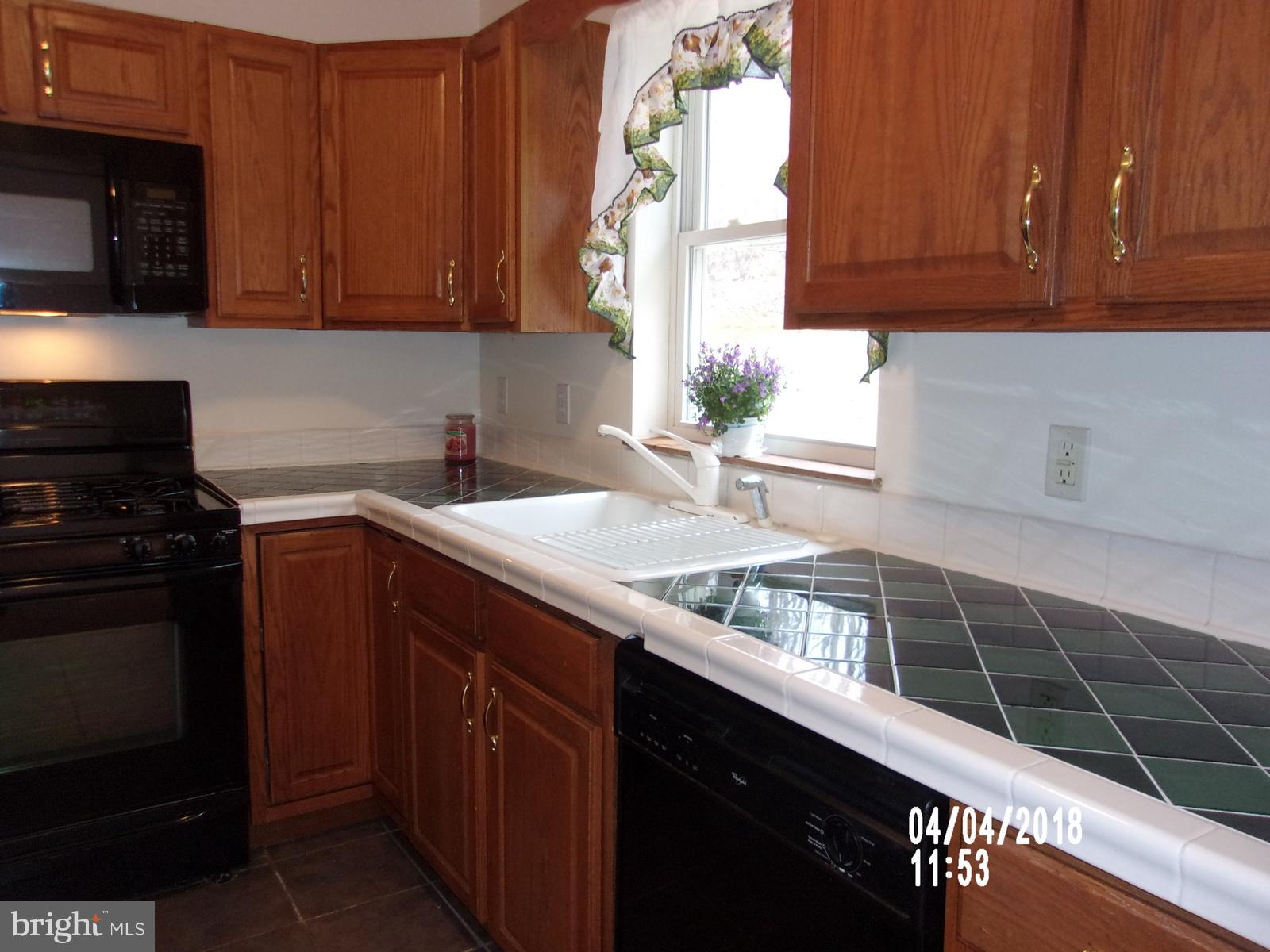 4764 Amos Road White Hall, MD 21161 - Photo 14 of 27 Kitchen cooking area