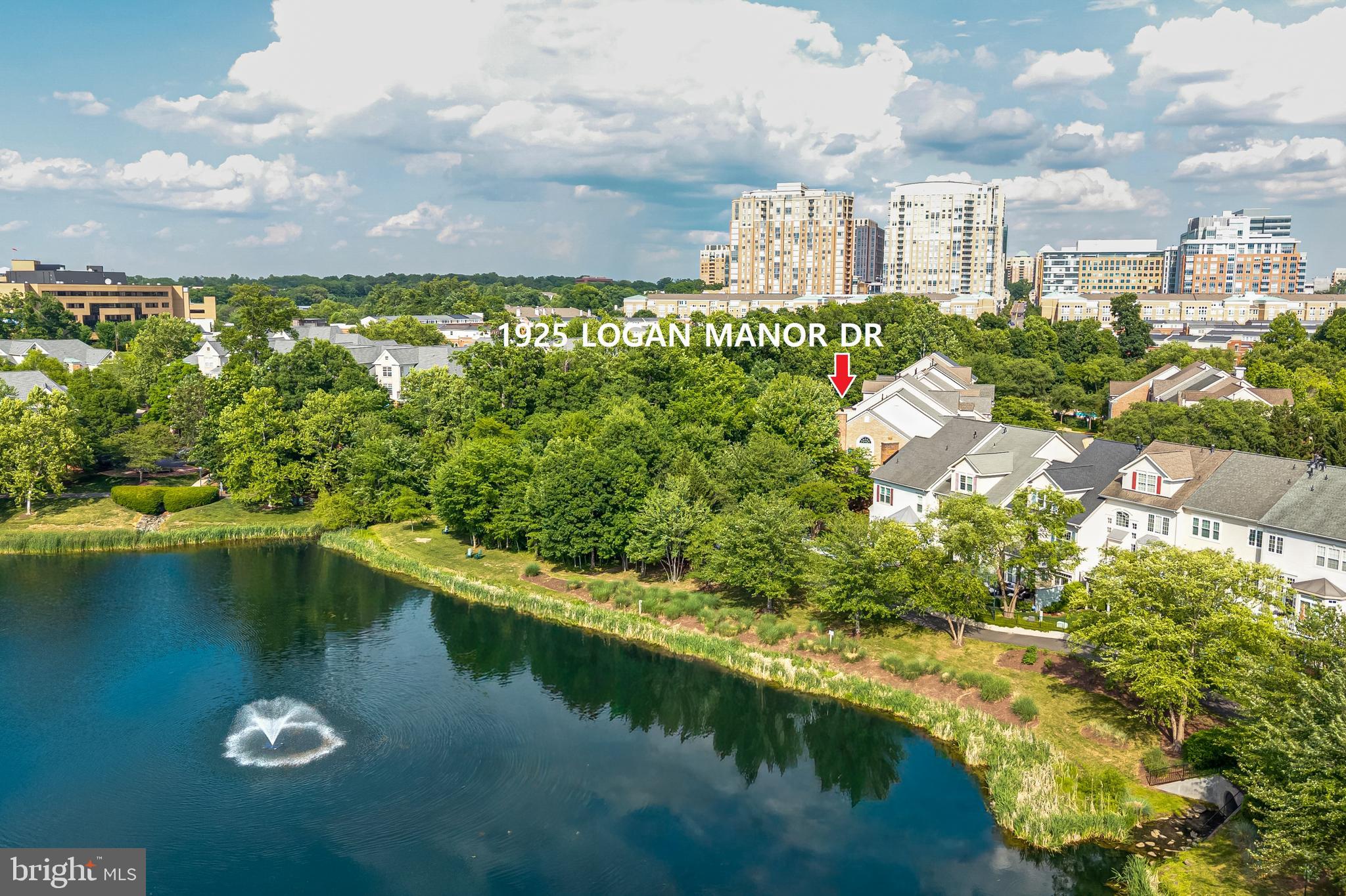 1925 Logan Manor Drive Reston, VA 20190 - Photo 48 of 61 a view of a lake with a city