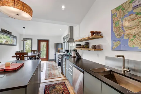 a kitchen with counter and workspace