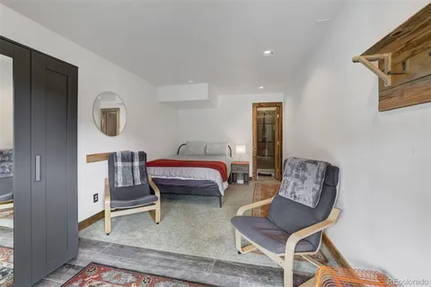 a room with furniture and a rug