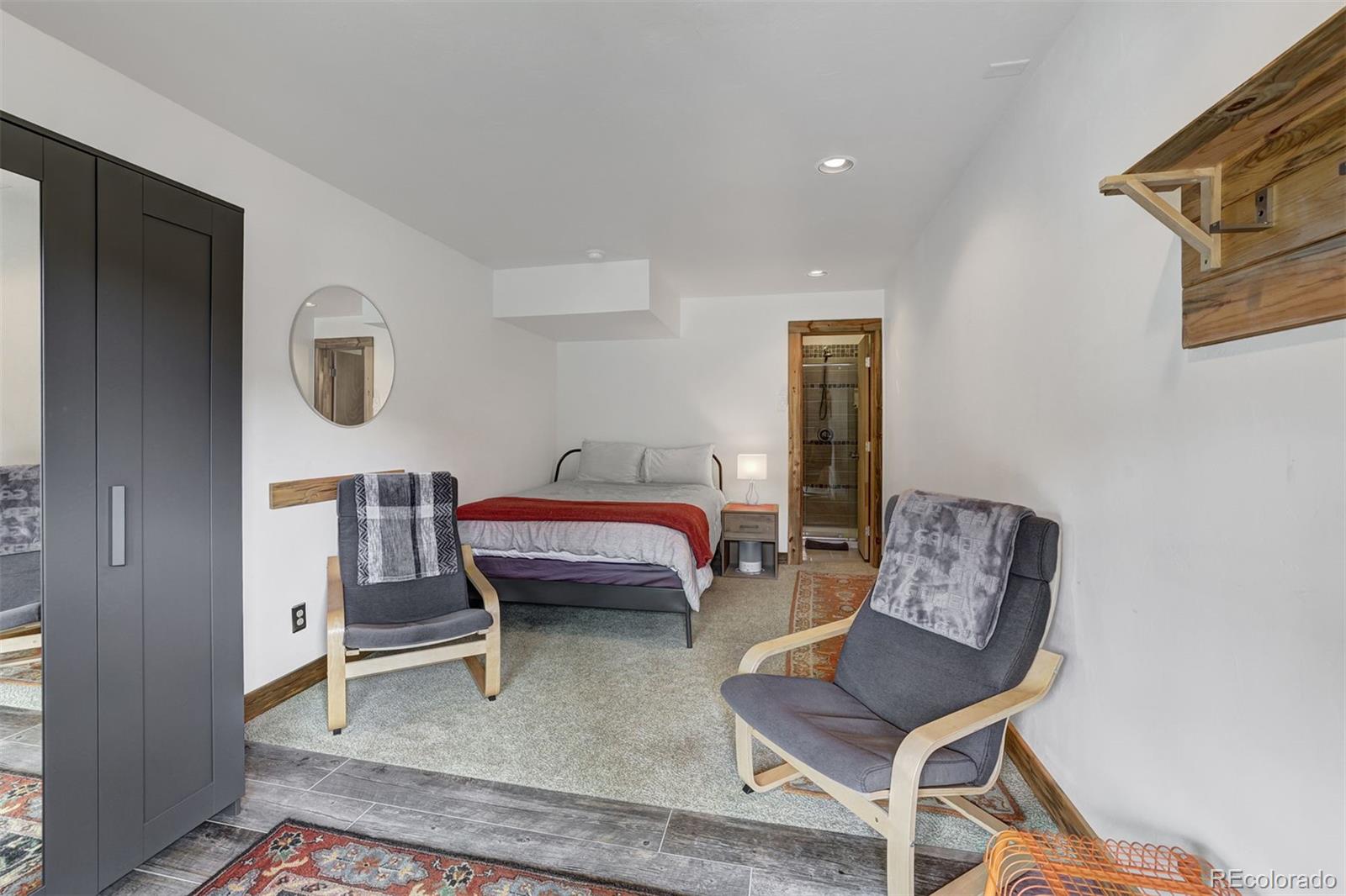 3049 County Road 6 Alma, CO 80420 - Photo 27 of 43 a room with furniture and a rug