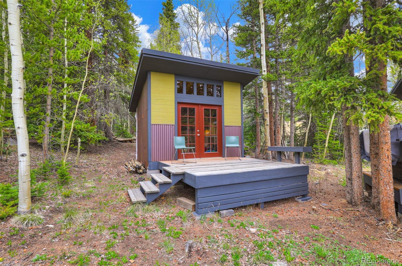 3049 County Road 6 Alma, CO 80420 - Photo 33 of 43 a view of house with a yard and sitting area