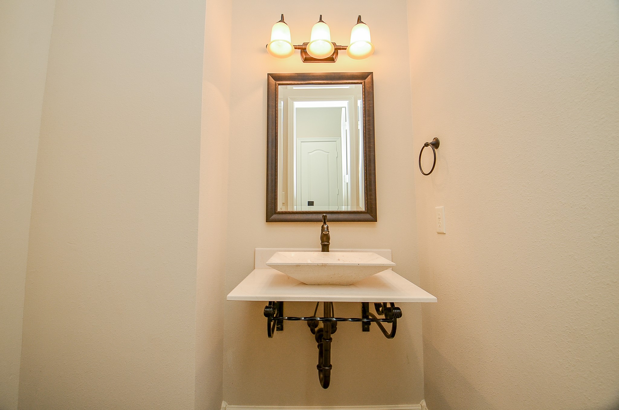 27914 Hunters Rock Lane Katy, TX 77494 - Photo 12 of 32 a bathroom with a sink and a mirror