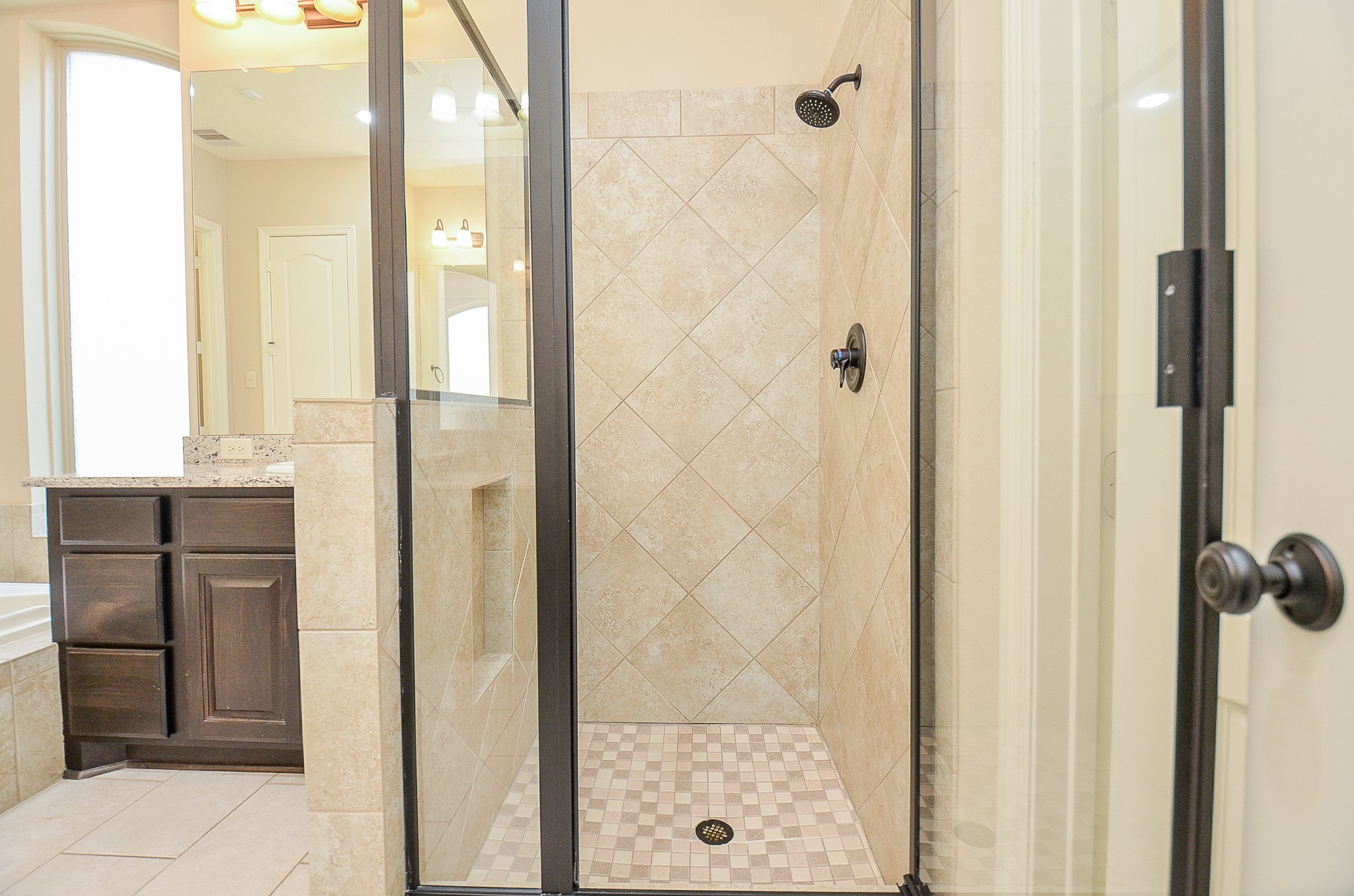 27914 Hunters Rock Lane Katy, TX 77494 - Photo 16 of 32 a bathroom with a shower and a sink