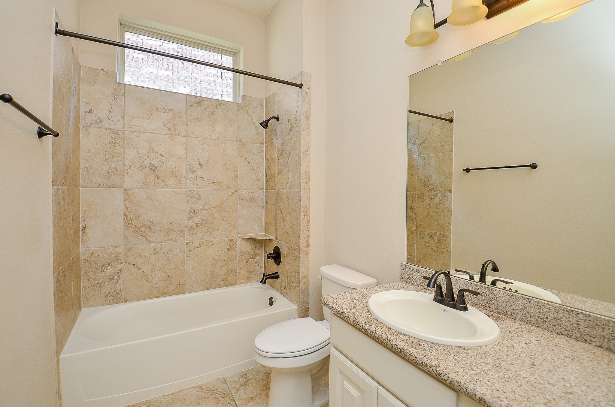 27914 Hunters Rock Lane Katy, TX 77494 - Photo 19 of 32 a bathroom with a sink a toilet and shower