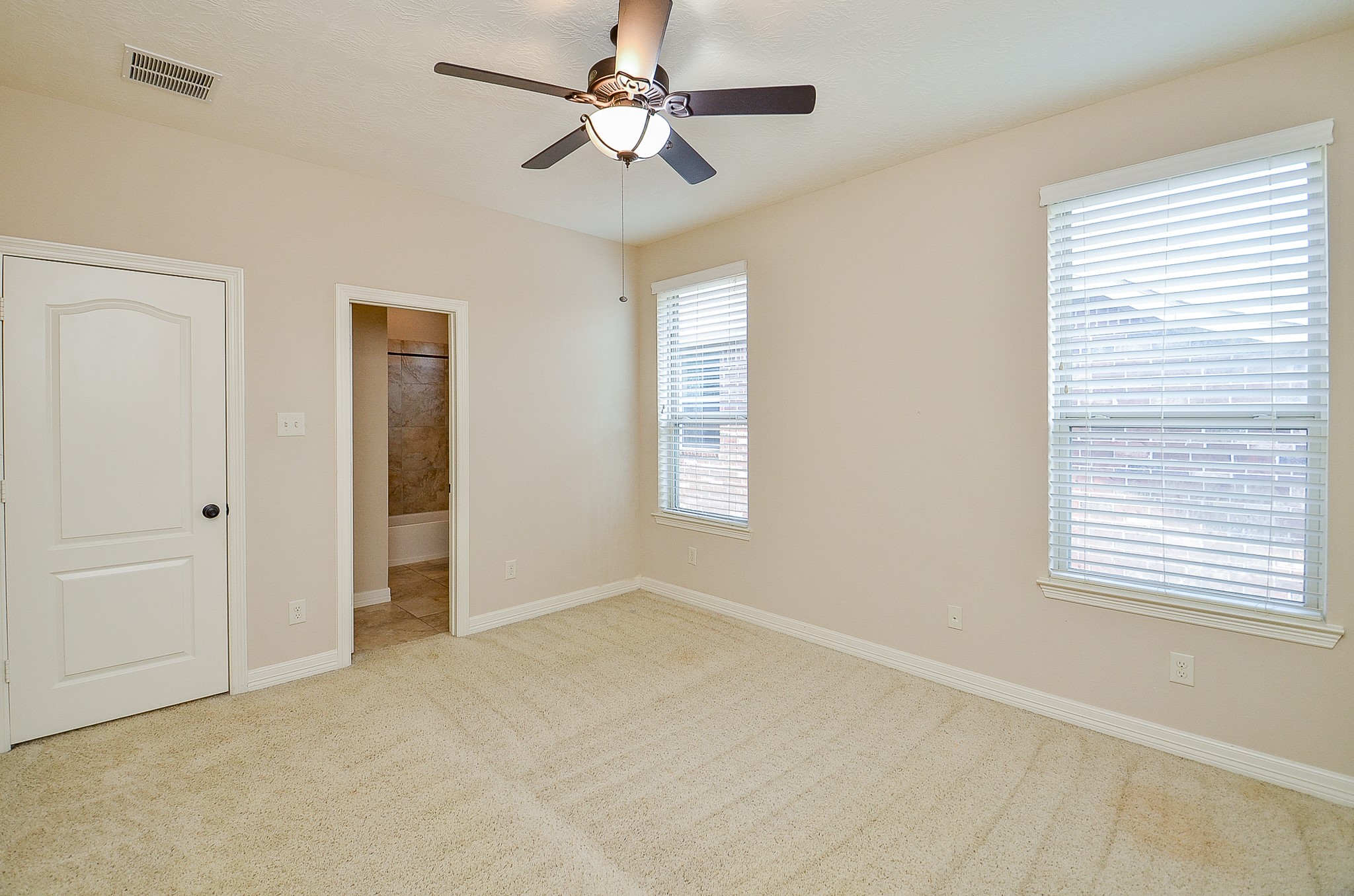 27914 Hunters Rock Lane Katy, TX 77494 - Photo 28 of 32 a view of an empty room with a window