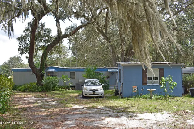 a car parked in front of a house