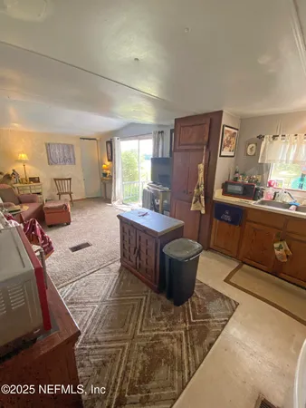 a living room with furniture and a couch