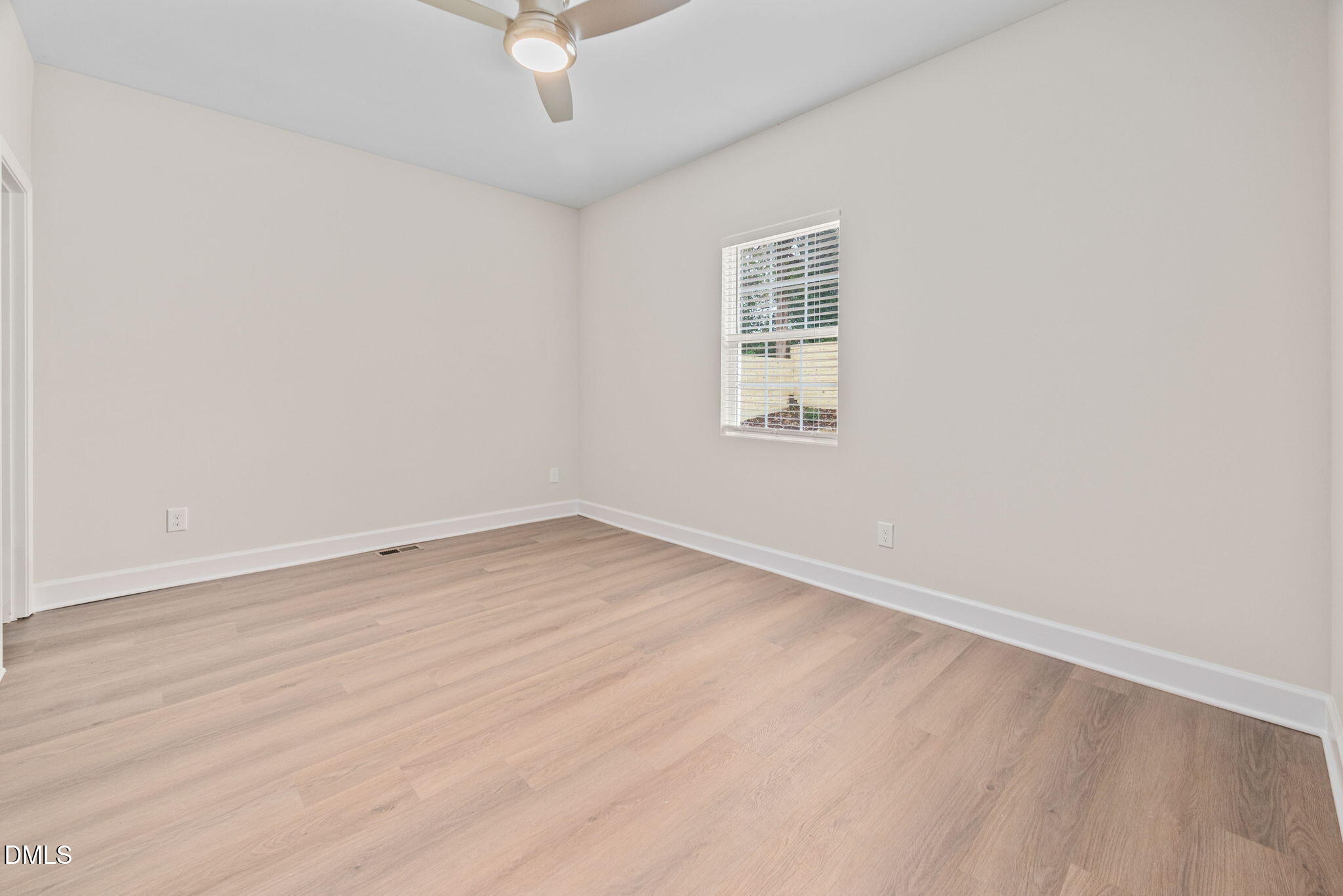 1106 South Blount Street Raleigh, NC 27601 - Photo 14 of 33 an empty room with a window