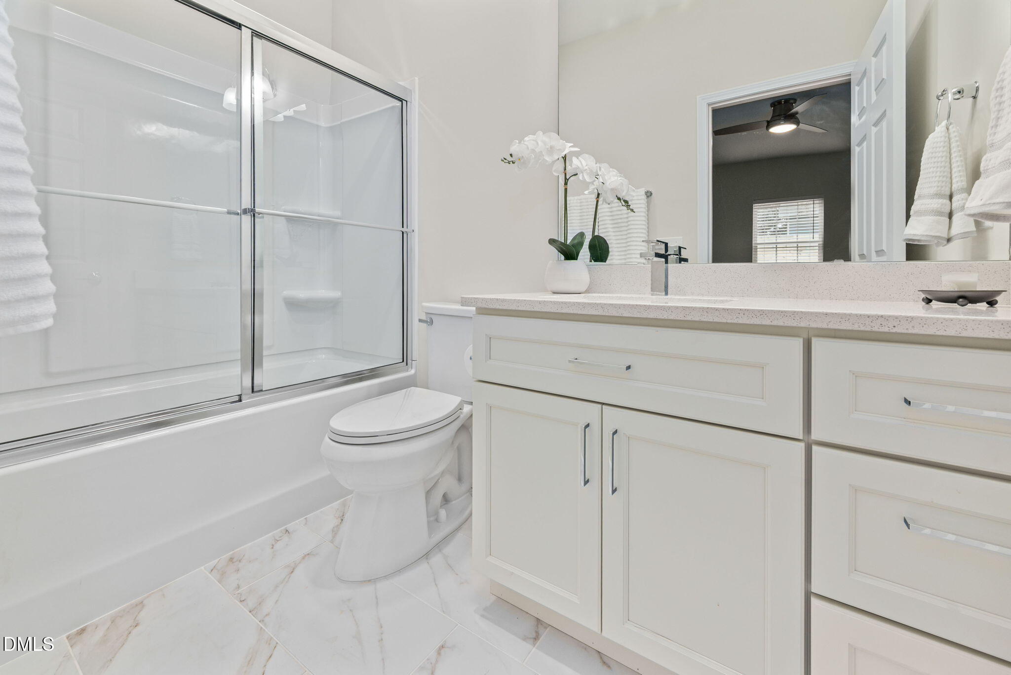 1106 South Blount Street Raleigh, NC 27601 - Photo 18 of 33 a bathroom with a sink toilet and shower