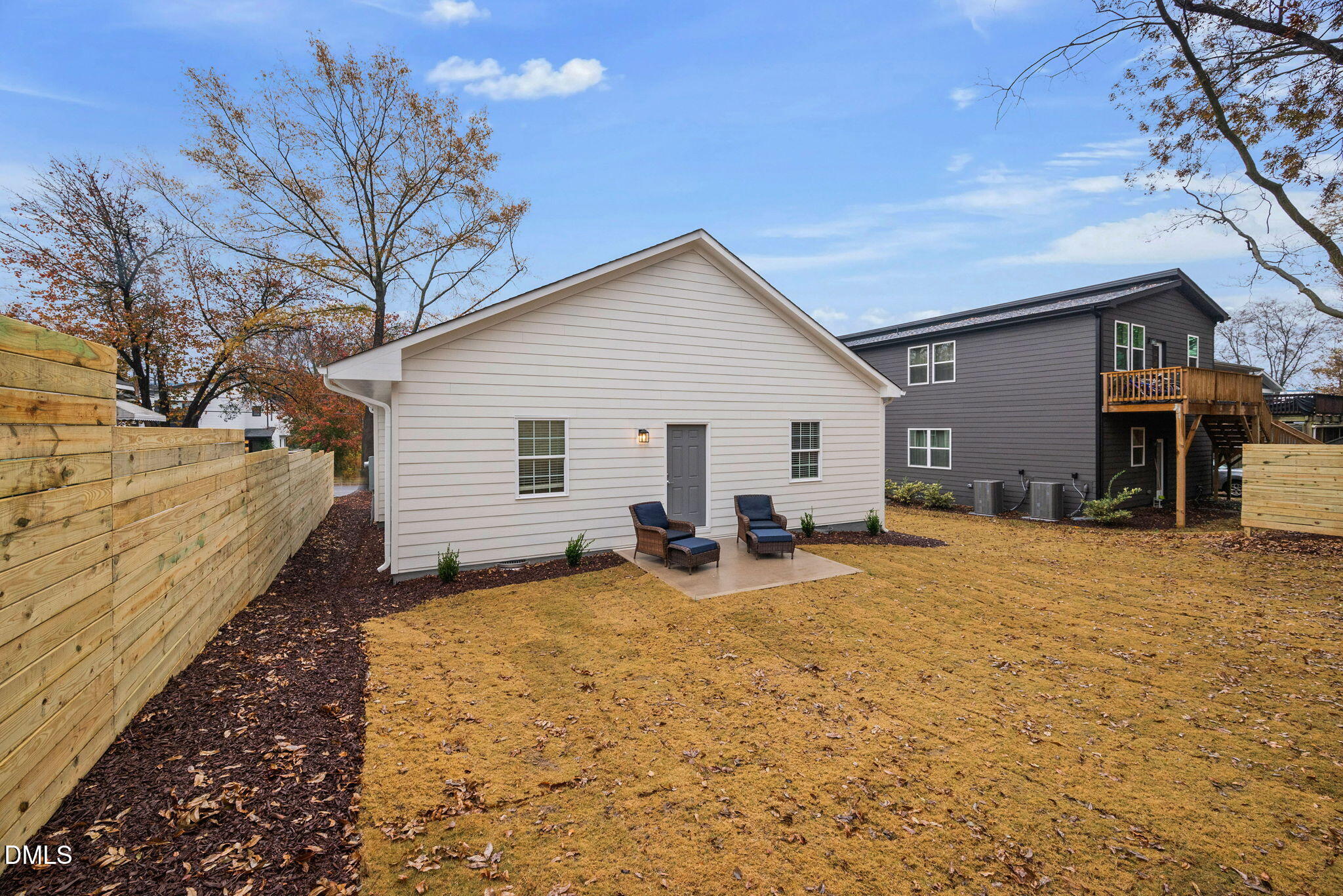 1106 South Blount Street Raleigh, NC 27601 - Photo 22 of 33 a view of a house with backyard and a tree