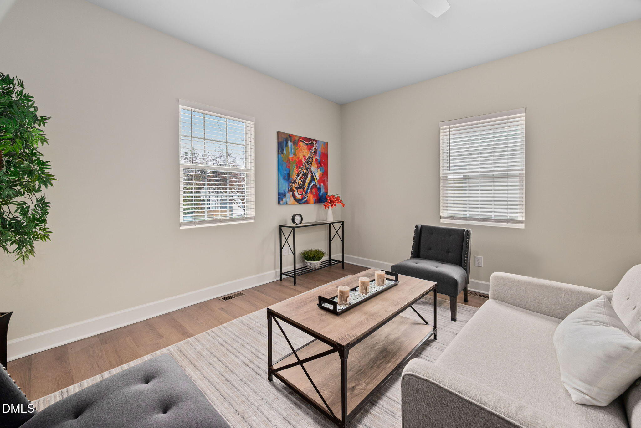 1106 South Blount Street Raleigh, NC 27601 - Photo 9 of 33 a living room with furniture and a window