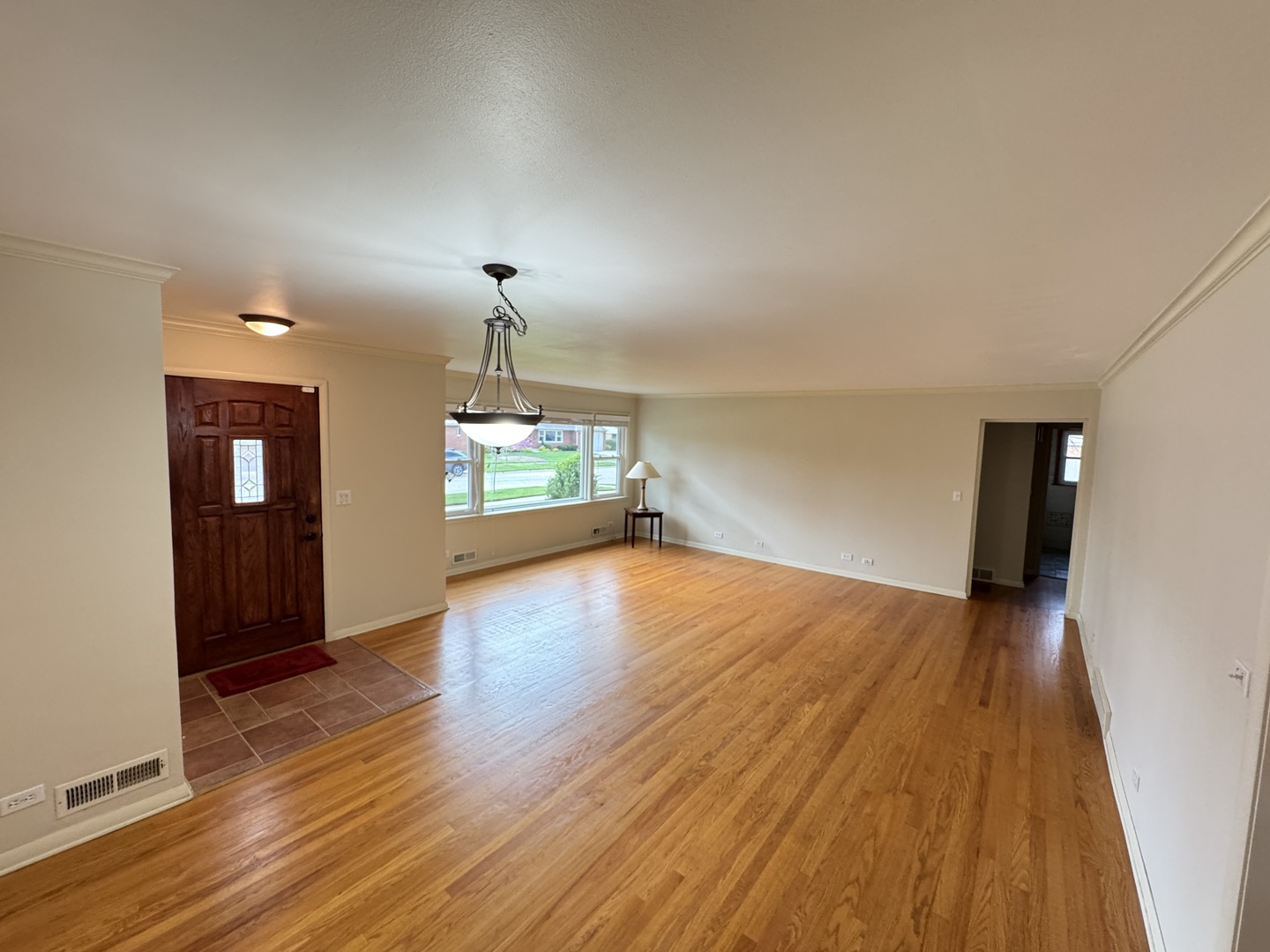901 Brookline Lane Park Ridge, IL 60068 - Photo 4 of 23 a view of empty room with wooden floor