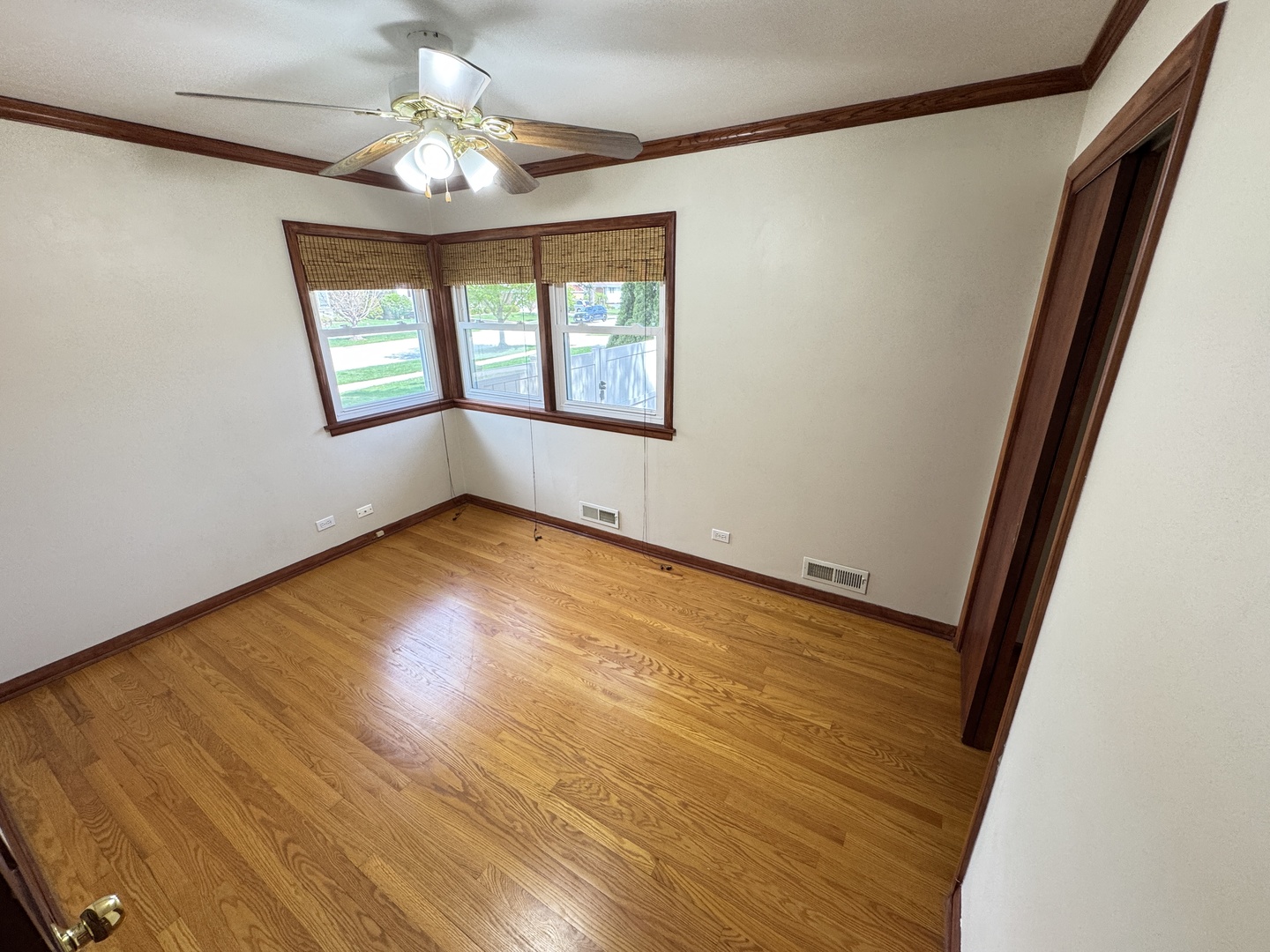 901 Brookline Lane Park Ridge, IL 60068 - Photo 8 of 23 wooden floor in an empty room with a window